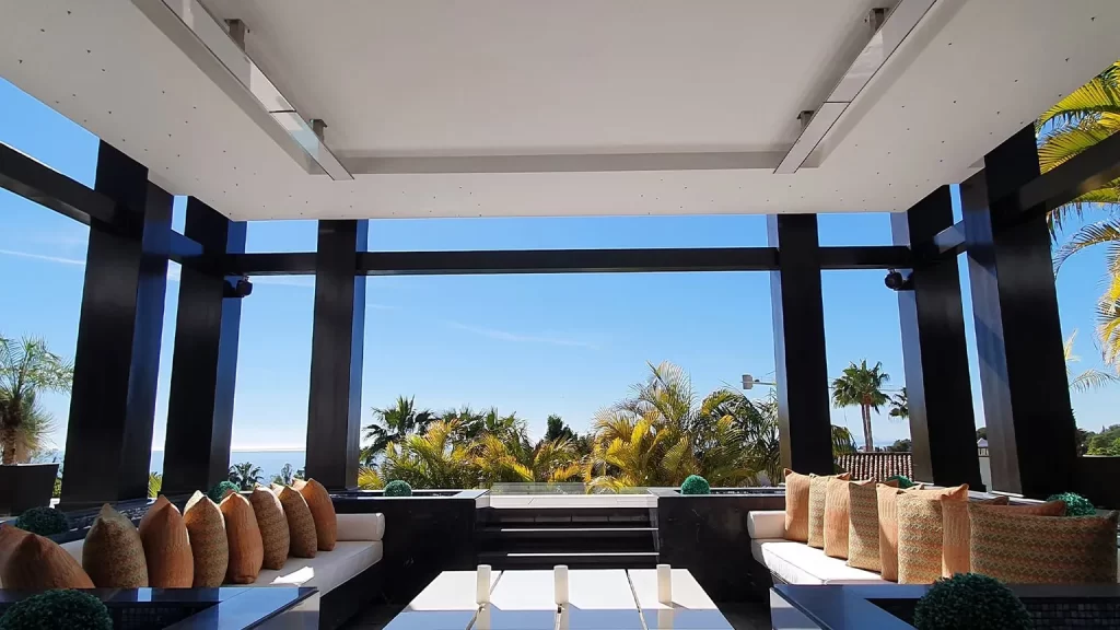 Bromic heaters recessed into a porch ceiling